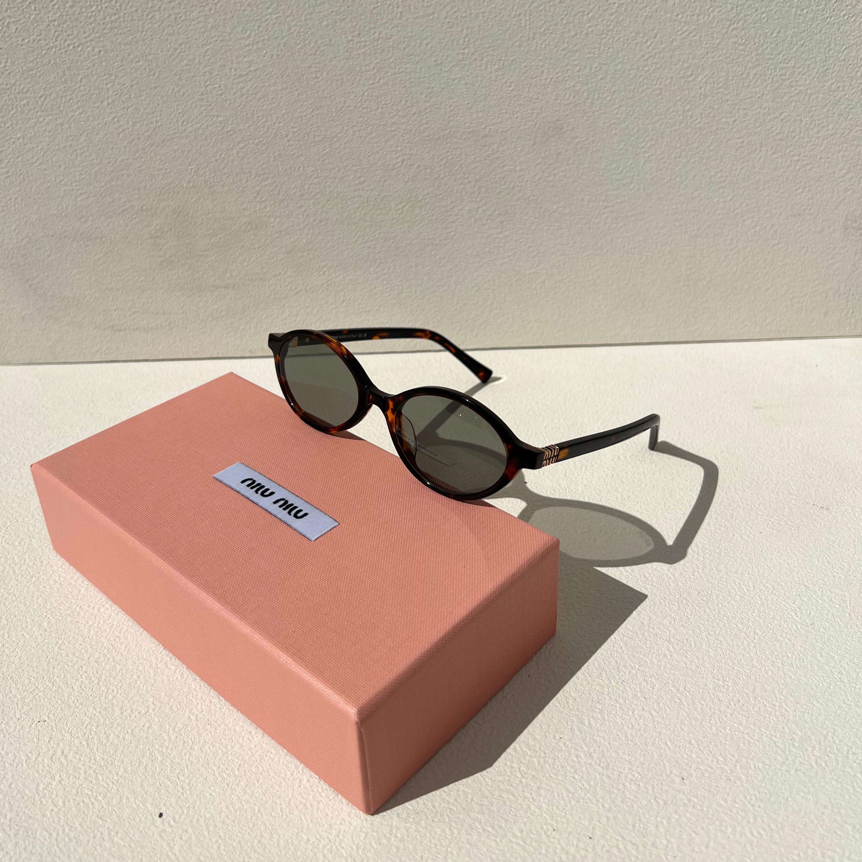 Miu Miu MU 01QV Oval Optical Glasses
