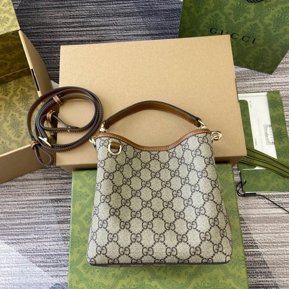 Gucci GG Emblem Small bucket bag
