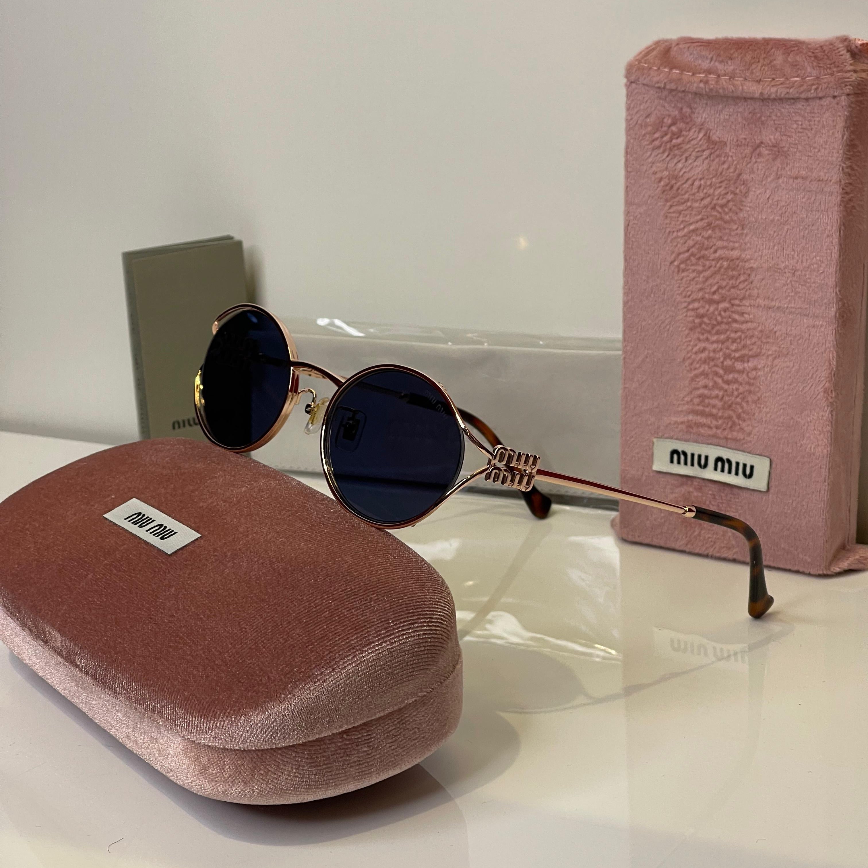 Miu Miu Round Gold Frame Sunglasses