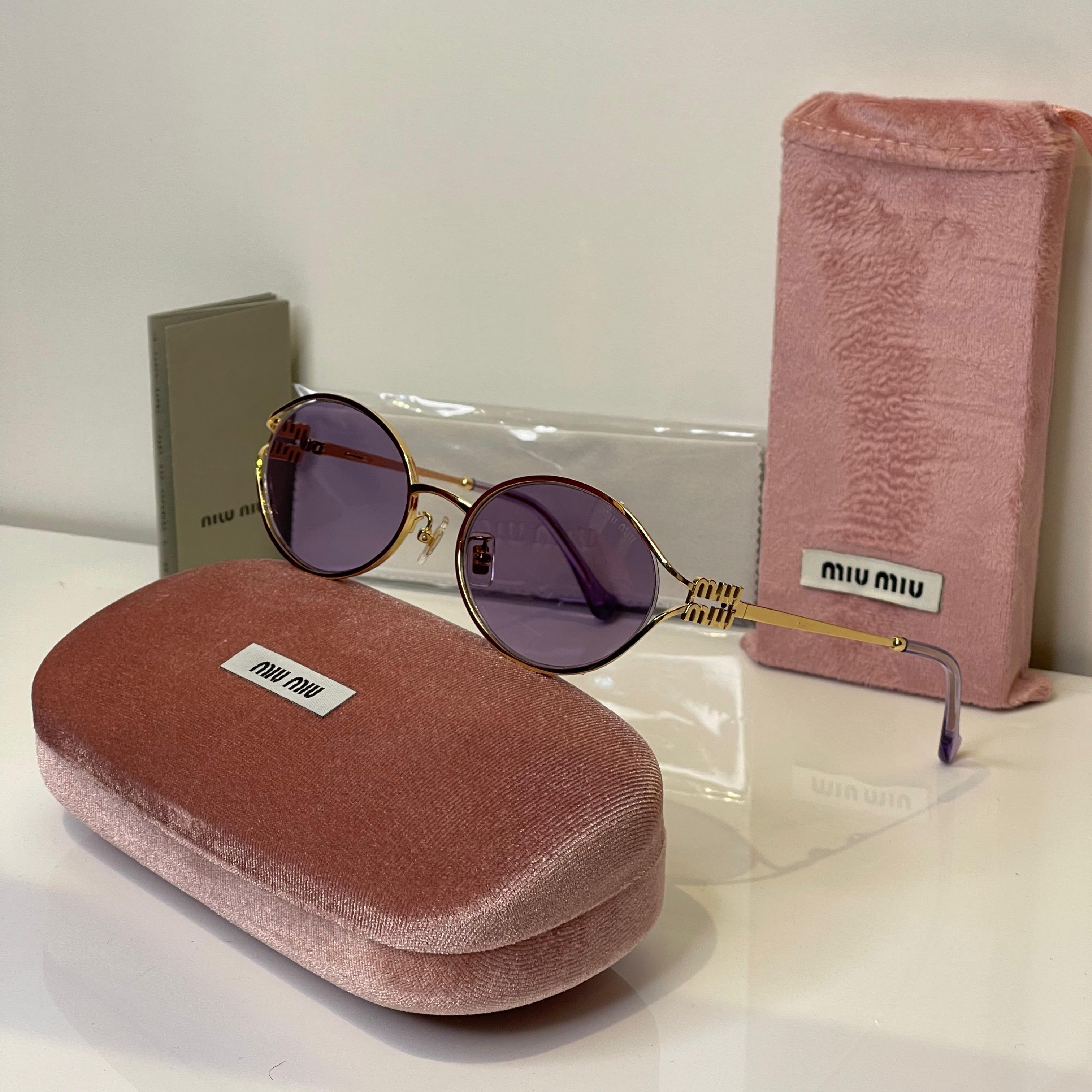 Miu Miu Round Gold Frame Sunglasses